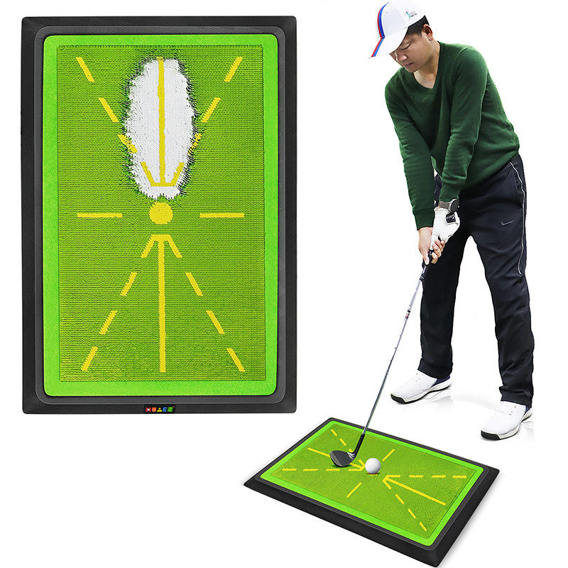 Golfer practising a swing on the strike-feedback mat